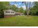 Charming home with mature trees in a serene setting at 1008 Hope Springs Ct, Stone Mountain, GA 30083
