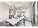 Elegant dining room with modern lighting fixtures, table setting and great view at 3475 Oak Valley Ne Rd # 2940, Atlanta, GA 30326