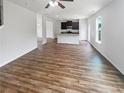 Spacious living room features hardwood floors and an open-concept layout, perfect for entertaining at 4452 Belcamp Rd, Fairburn, GA 30213