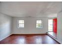 Bright living room with wood floors, fresh paint, and abundant natural light at 1151 Rankin St # 2C, Stone Mountain, GA 30083