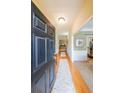Inviting entryway boasting hardwood floors and a view into the home's living spaces at 905 Downyshire Dr, Lawrenceville, GA 30044