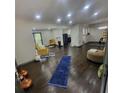 Open floor plan with hardwood floors and recessed lighting at 2704 Terratim Ln, Decatur, GA 30034