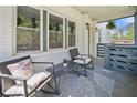 Relaxing front porch with cozy seating, perfect for enjoying the outdoors at 2111 Holly Hill Dr, Decatur, GA 30032