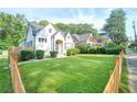 Charming home featuring a well-kept lawn and quaint architecture at 98 Chappell Nw Rd, Atlanta, GA 30314