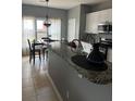 Bright eat-in kitchen with granite countertops and stainless steel appliances at 280 Ridge Bluff Ln, Suwanee, GA 30024