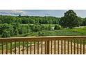 Scenic view of lush green landscape visible from the backyard at 6490 Mockingbird Rd, Cumming, GA 30028