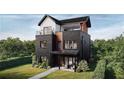 Modern three-story home boasts a porch and upper-level balcony perfect for enjoying outdoor living at 328 Treble Way, Alpharetta, GA 30009