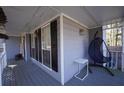Cozy front porch features stylish seating, offering a relaxing outdoor space at 701 Monticello Ln, Mcdonough, GA 30253