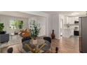 Open-concept living area with modern furnishings and hardwood floors at 3181 Pennington Sw Cir, Atlanta, GA 30354
