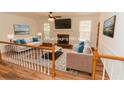 Bright living room with fireplace and large windows at 3572 Stone Ridge Trl, Douglasville, GA 30134