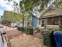 A street view showcasing cozy homes with colorful facades, green foliage, and sidewalks in a residential area at 712 Garibaldi Sw St, Atlanta, GA 30310