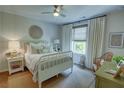 Cozy bedroom with decor, large window, chair and a large area rug at 14 Lochurst Ln # 153, Roswell, GA 30076