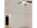 Cozy bedroom featuring a ceiling fan, neutral paint, carpeted floors, and natural lighting at 5410 Lenox Park Pl, Buford, GA 30518