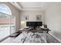 Bright office space with large window, tray ceiling, and space for a treadmill at 2507 Fairweather Se Ct, Conyers, GA 30013