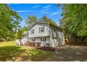 Two-story home with attached garage and long driveway offering ample parking at 2994 Cathy Ann Nw Ct, Acworth, GA 30101
