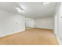 Bright living room with neutral walls, carpet flooring, and ample natural light at 1111 Clairemont Ave # J6, Decatur, GA 30030