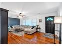 A stylish living room featuring hardwood floors, contemporary decor, and a welcoming atmosphere at 115 Pine Tree Dr, Fayetteville, GA 30214