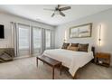 Serene bedroom featuring neutral colors, a ceiling fan, and a comfortable king-sized bed at 243 Retreat Ln, Canton, GA 30114