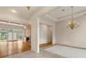 Open living room with hardwood floors, fireplace, and ample natural light at 5510 Conway Dr, Marietta, GA 30068