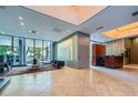 Spacious lobby with tile flooring, modern decor, seating area, and bright lighting fixtures at 147 15Th Ne St # 16C, Atlanta, GA 30309
