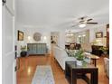 Bright living room boasts hardwood floors, stylish furnishings, and a welcoming atmosphere at 1149 Midland Nw Dr, Acworth, GA 30102