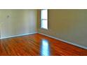 Spacious living room with gleaming hardwood floors and natural light at 207 Brownlee Sw Rd, Atlanta, GA 30331