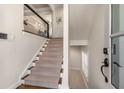 Bright entryway with staircase, light walls, and hardwood floors at 540 Woodall Ne Ave, Atlanta, GA 30306