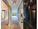 Inviting entryway leading to a living room and kitchen with modern finishes at 27306 Plantation Ne Dr, Atlanta, GA 30324