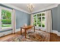 Cozy home office with large windows, natural light, and hardwood floors at 4005 N Stratford Ne Rd, Atlanta, GA 30342