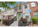 Attractive townhome showcasing a tidy facade, landscaped entrance, and a neighborhood setting at 2864 Vining Ridge Ter, Decatur, GA 30034
