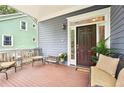 Inviting front porch with seating, perfect for relaxing and enjoying the outdoors at 424 Melrose Ave, Decatur, GA 30030