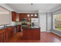 Charming eat-in kitchen with stainless steel appliances and granite countertops at 1530 Wehunt Se Cir # 19, Smyrna, GA 30082