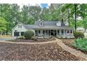 Charming two-story home with a brick walkway and well-maintained landscaping at 2130 Monticello Pl, Lawrenceville, GA 30043