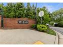 Brick sign showing entrance to Telfair community at 100 Barnard Pl, Atlanta, GA 30328