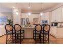 Well-lit kitchen showcasing granite countertops, stainless steel appliances, and modern pendant lights at 2448 Gatebury Cir, Atlanta, GA 30341