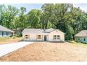A small, charming home with fresh white paint, new landscaping, and lots of sunlight at 783 Britt Sw Rd, Mableton, GA 30126