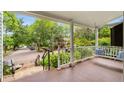 Inviting front porch with swing and views of the street at 865 Ashland Ne Ave, Atlanta, GA 30307