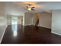 Spacious living room with hardwood floors, with a sliding glass door at 1231 Providence Way, Lawrenceville, GA 30046