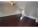 Spacious living room with hardwood floors and bright natural light at 1231 Providence Way, Lawrenceville, GA 30046
