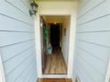 Inviting entryway with a light-colored door and sidelight, leading to a home's interior hallway at 24 Samuel Nw Way, Cartersville, GA 30121