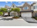 Inviting townhome with a two-car garage and appealing landscaping in a well-maintained neighborhood at 565 Stone Field Nw Run, Marietta, GA 30060
