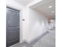 Hallway leading to unit, showcasing well-maintained interiors and neutral color palette at 3040 Peachtree Nw Rd # 815, Atlanta, GA 30305