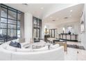 Open-concept lobby with comfortable seating areas, upscale reception, and abundant natural light at 3040 Peachtree Nw Rd # 815, Atlanta, GA 30305