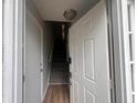 A view through the front door shows a hallway and stairs with neutral colors at 3948 Valley Brook Rd, Snellville, GA 30039