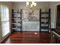 Elegant dining room featuring hardwood floors and stylish decor at 2122 Riverbirch Ne Ct, Lawrenceville, GA 30044