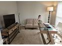 Cozy office space with comfortable seating and a functional work area at 2122 Riverbirch Ne Ct, Lawrenceville, GA 30044