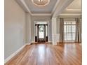 Living room with hardwood floors and trim details at 5195 Stefan Ridge Way, Buford, GA 30519