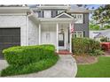 Inviting front porch with classic columns and manicured landscaping at 2773 Brookgrove Se Ln, Atlanta, GA 30339