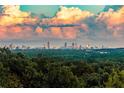 Panoramic view of the city skyline with striking clouds, creating a picturesque backdrop at 4100 Paces Se Walk # 4306, Atlanta, GA 30339