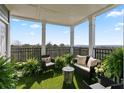 Inviting patio with comfortable seating and lush greenery, perfect for relaxation and enjoying the views at 4100 Paces Se Walk # 4306, Atlanta, GA 30339